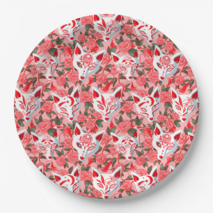 Kitsune masks and blooming camellia on pink paper plate