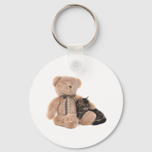 kitten in the arms of a teddy bear keychain