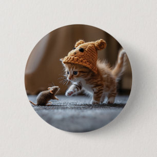 Kitten playing with a small mouse 2 inch round button