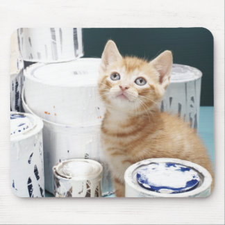 Kitten sitting amongst paint tins mouse pad
