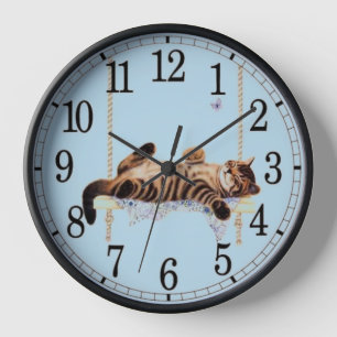 Kitten sleeping clock