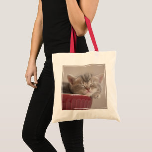 Kitten Sleeping In A Bowl Tote Bag