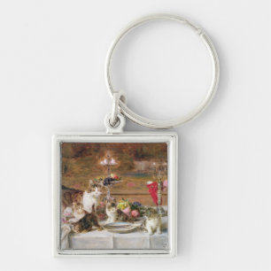 Kittens at a banquet, 19th century keychain