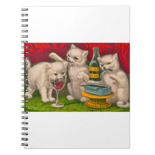 Kittens drinking and eating sardine fish notebook