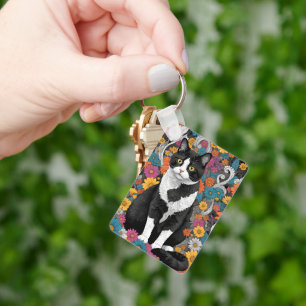 Kitty among the flowers keychain
