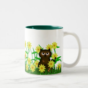 Kitty mignon et tasse d'ami de Froggy