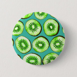 Kiwi slices on turquoise 2 inch round button
