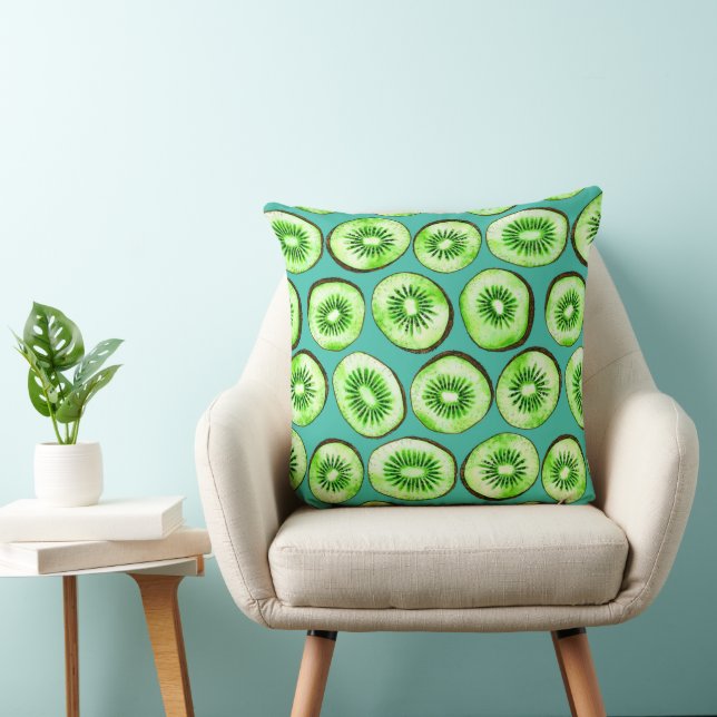 Kiwi slices on turquoise throw pillow (Chair)