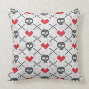 Knitted pattern with skulls throw pillow
