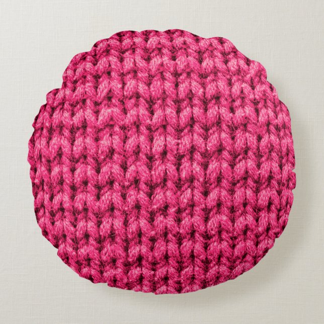 Knitted pink background. Yarn texture. Vertical kn Round Pillow (Front)