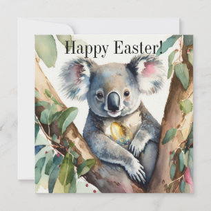 Koala bear holding a gold easter egg card