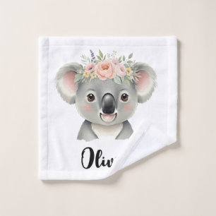 Koala mignon portant une couronne faite de fleurs