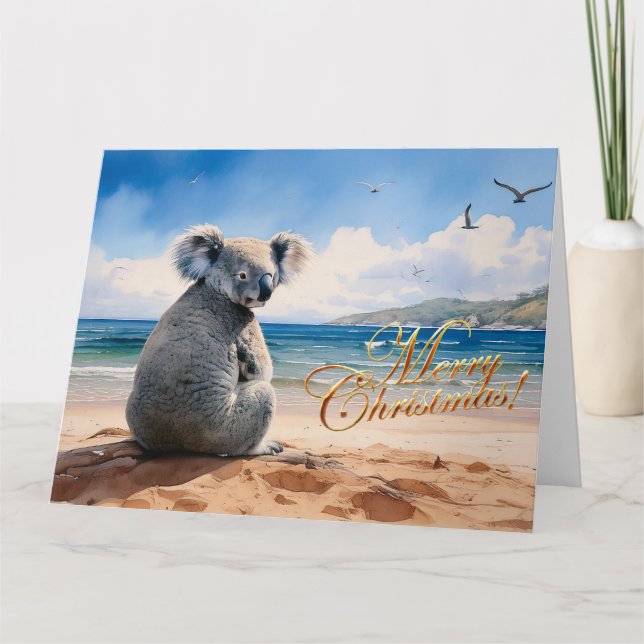Koala on a sandy beach Merry Christmas Card (Front)