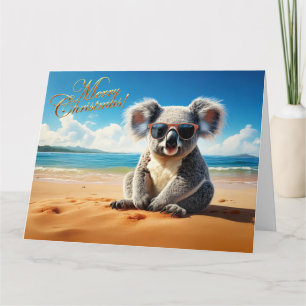 Koala on a sandy beach Merry Christmas Card