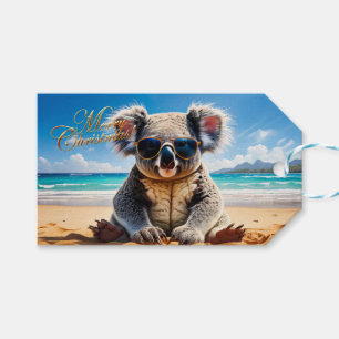 Koala on a sandy beach Merry Christmas Gift Tags