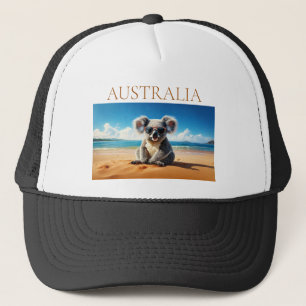Koala on a sandy beach trucker hat
