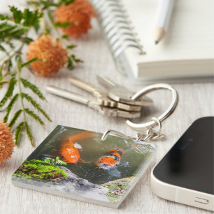 Koi fish in a pond keychain