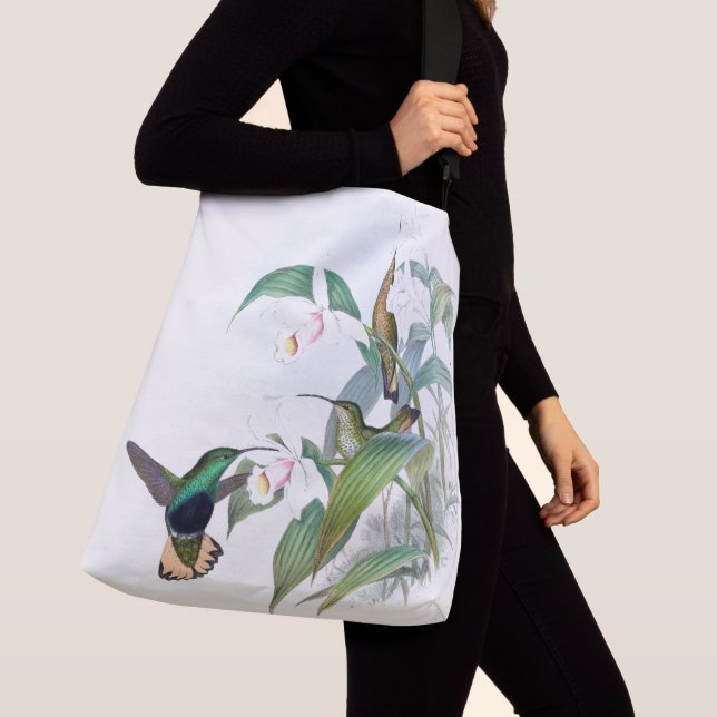 La faune d'oiseaux de colibri fleurit le sac (De près)