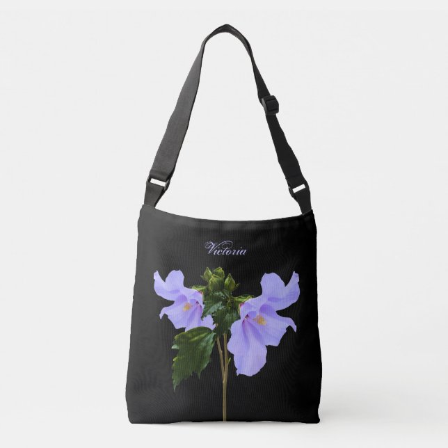 La ketmie bleue fleurit les sacs fourre-tout noirs (Devant)
