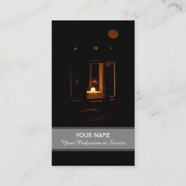 La lumière des bougies illumine le carte de visite (Devant)