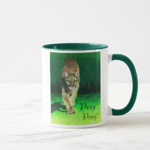 La proie prient la tasse de puma