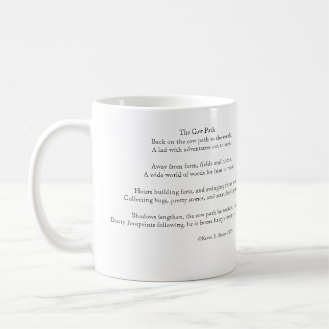 La tasse de café de chemin et de poème de vache (Gauche)