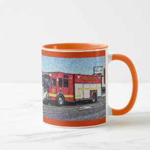 La tasse potable du pompier rouge de camion de