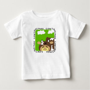 La vache indique des T-shirts et des cadeaux de