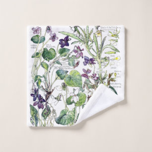 La violette botanique fleurit des serviettes de