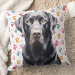 Labrador Retriever Colourful Paw Prints Dog Lover Throw Pillow<br><div class="desc">Introducing our Labrador Retriever Pillow, the perfect addition to any dog lover's home decor collection. Available in black, yellow or chocolate labs, this pillow features colourful paw prints in a retro yet modern style. Designed for labrador lovers, breeders, dog moms and dads alike, this pillow is a stylish way to...</div>