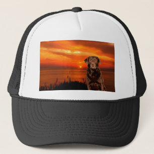 Labrador Retriever Dog Sitting beside Sunset Trucker Hat