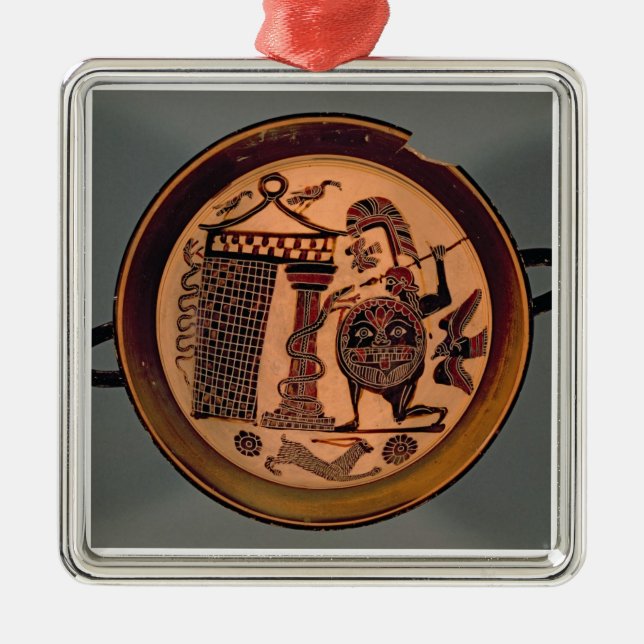 Laconian black-figure cup depicting a warrior atta metal ornament (Front)