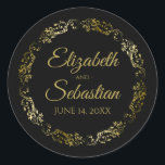 Lacy Gold Filigree Elegant Black Wedding Favour Classic Round Sticker<br><div class="desc">These elegant wedding stickers feature fancy gold script text on a black background with a lacy gold faux foil floral border. The text is fully customizable and contains the wedding couple's names and wedding date. Great as favour tags or envelope seals!</div>