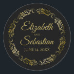 Lacy Gold Filigree Elegant Black Wedding Favour Classic Round Sticker<br><div class="desc">These elegant wedding stickers feature fancy gold script text on a black background with a lacy gold faux foil floral border. The text is fully customizable and contains the wedding couple's names and wedding date. Great as favour tags or envelope seals!</div>