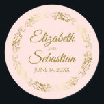 Lacy Gold Filigree Elegant Blush Pink Wedding Classic Round Sticker<br><div class="desc">These beautiful wedding stickers are feature gold text on a blush pink background with a gold faux foil floral border. The text is fully customizable and contains the wedding couple's names and wedding date. Great as favour tags or envelope seals!</div>