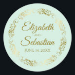Lacy Gold Filigree Elegant Neo Mint Green Wedding Classic Round Sticker<br><div class="desc">These beautiful wedding stickers are feature gold text on a light neo mint green background with a gold faux foil floral border. The text is fully customizable and contains the wedding couple's names and wedding date. Great as favour tags or envelope seals!</div>
