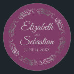 Lacy Silver Filigree Elegant Cassis Purple Wedding Classic Round Sticker<br><div class="desc">These elegant wedding stickers feature fancy pale grey script text on a cassis purple,  magenta,  or berry coloured background with a lacy silver faux foil floral border. The text is fully customizable and contains the wedding couple's names and wedding date. Great as favour tags or envelope seals!</div>