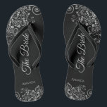 Lacy Silver on Black Elegant The Bride Wedding Flip Flops<br><div class="desc">Dance the night away with these beautiful wedding flip flops. Designed for the bride, they feature a simple yet elegant design with grey script lettering on a classic black background and fancy silver grey decorative curls and swirls. Beautiful way to stay fancy and appropriate while giving your feet a break...</div>