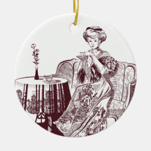 lady drinks tea ceramic ornament
