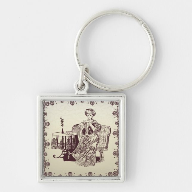lady drinks tea keychain (Front)