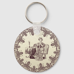 Lady drinks tea keychain
