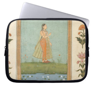 Lady holding a flower, standing by a lily pond, fr laptop sleeve