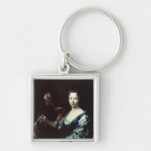 Lady playing a spinet and a flautist keychain