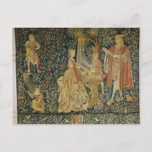 Lady playing the portative organ from postcard