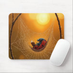 Ladybug in a Spider Web Hammock Mouse Pad<br><div class="desc">A ladybug relaxes in a spider web hammock,  reading a book as sunlight and sparkling raindrops surround it</div>