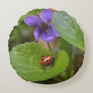 Ladybug on Sweet Violet Flowers Round Pillow