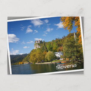 Lake Bled with trees in autumn colours in Slovenia Postcard