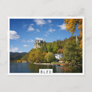 Lake Bled with trees in autumn colours in Slovenia Postcard