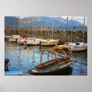 Lake Como, Traditional lake boat in the marina Poster