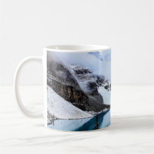 LAKE NEAR SNOW COVERED MOUNTAIN DURING DAYTIME COFFEE MUG